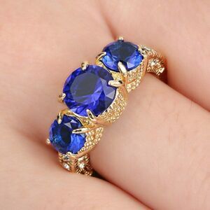Round Blue Sapphires Yellow Rhodium Plated Ring